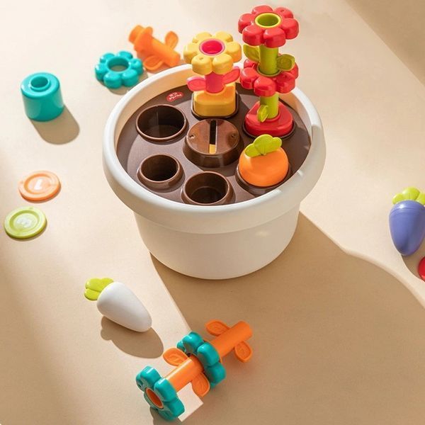 Розвиваючий сортер Монтессорі Hola Toys Горщик з квітами 26 предметів HE795800 фото